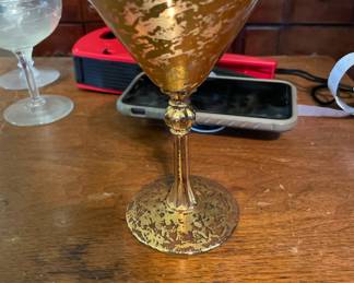 Set of gold glass martini glasses