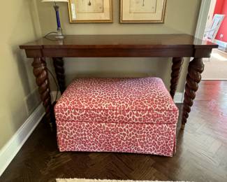 Custom ottoman in  red Clarence House leopard print      17"h x 36"w x 23"d