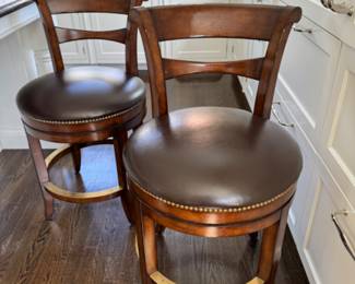 Leather swivel counter stools                  37"h x 21"w x 25"d seat height 24"