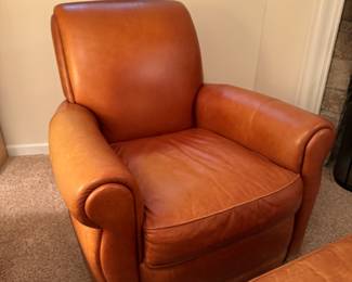 Leather lounge chair & ottoman   $400                                        34"h x 33"w x 39"d  ottoman: 16"h x 21.5"x 17"