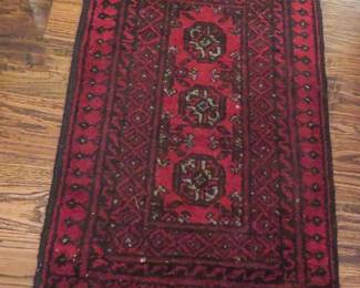 Hand knotted small rug