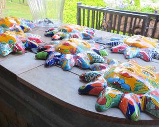 Mexican pottery sun faces