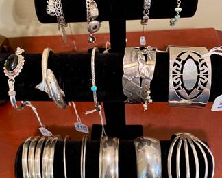 Sterling cuffs, including signed artisan and Native American 