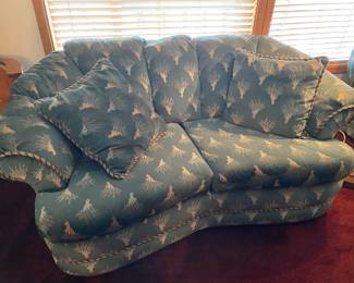 Blue/White Patterned Upholstery Curved Loveseat with Clamshell Back