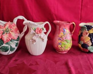 Four Unique Hand Crafted And Store Bought Ceramic Pitchers