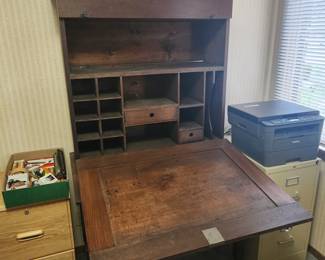 Antique desk from McLean co Court house. In terrific working condition. Top records cabinet and bottom writing desk.