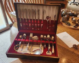 3 different sets of flatware, one w box