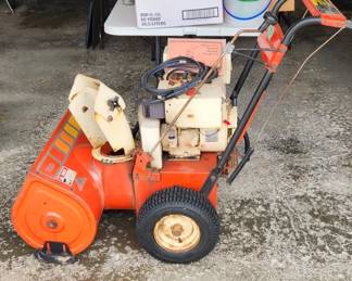 Snowblower, older but works perfectly!! Has original booklet and all accessories 