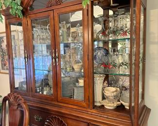 American Drew china closet with mirrored back and inside lighting