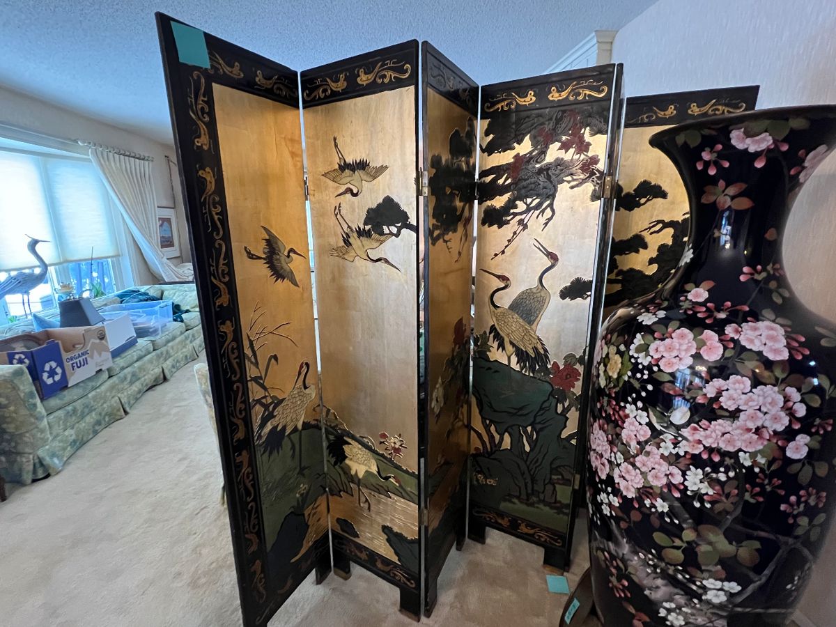 Japanese Meiji-era (1868-1912) 58" monumental cloisonné urn and 72x96 twentieth century Chinese export six-panel Coromandel gilt screen. The urn depicts birds within a plum tree in full bloom on a midnight blue background.  The screen shows cranes and riverside landscape on a gilt background. The reverse has a simpler nature design against black lacquer. The two together delighted family and visitors for decades. Dramatic decoration for Asian art lovers! Contact us for a pre-sale viewing.  $1000 each for the urn and screen. $1800 together.