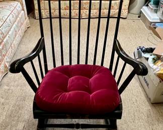 Nichols & Stone Boston or Hitchcock rocker from the 1960s. Black enamel with stenciled designs in soft tones. Red seat cushion.