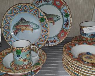 "Splash" dinnerware by Siddhia Hutchinson features four different illustrations of fish or lures for each piece: bowl, plates, mugs. Very collectible.