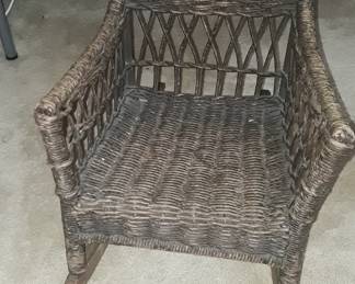 Arts & Crafts period child's wicker rocker