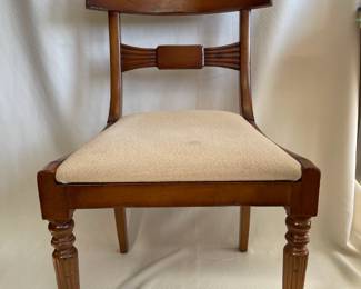 Pair of Baker Milling Road neoclassical Tuscan Italian-style dining side chairs. Notice the detailed turned front legs.
H 34.75" x W 21.5" x D 23.5"