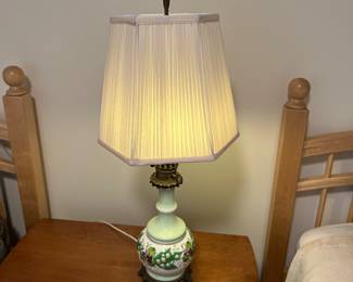 Antique glass Victorian oil lamp converted to table lamp. It's decorated with charming violets and lilies of the valley. $95