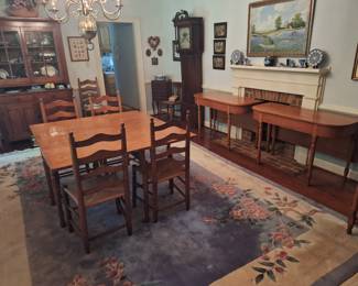 dining room with Early 19th C American maple dining table converted to smaller 54"x 50" table and two demi-lune end tables, carved wool rug
