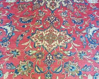 large Oriental rug in English Pub Room, dimensions and details to follow, note some wear and condition issues