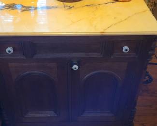 Pair of marble top small tables 