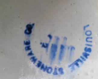 Louisville Stoneware Company planter and wrought iron stand