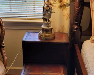 antique bedsteps used as a nightstand