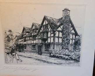 #23 Half timbered houses and men with golf clubs