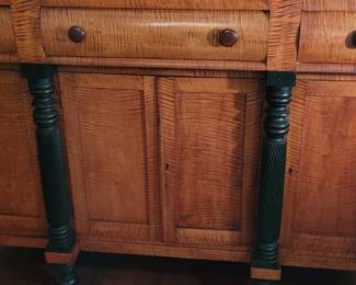 Close-up of tiger maple Empire style sideboard