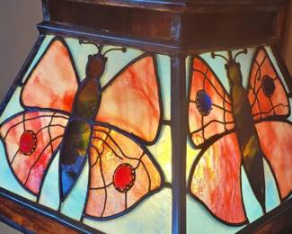 Antique stained glass lamp with butterfly design