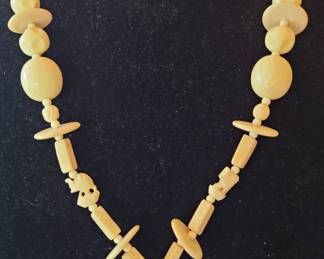 #63 carved bone necklace with beads and elephants 17"