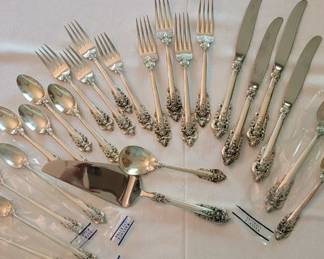 Wallace Sterling Silver Grande Baroque 24 pieces total.  Four 5-piece place-settings and four additional serving pieces