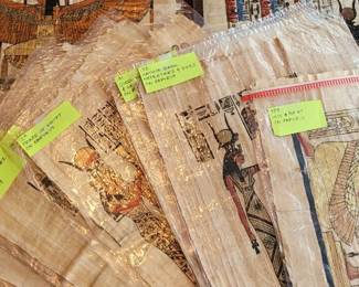 over 30 Egyptian paintings on papyrus, purchased by the homeowners in Egypt at the Pyramids in the 1970's