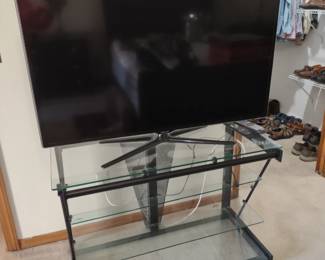 Samsung TV and glass TV stand