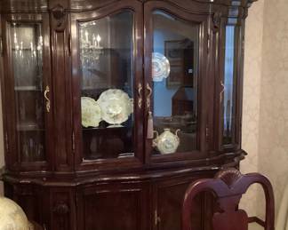 Karges beveled and bowed glass cupboard