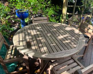 $380. Teak dining set 48" diameter x 27"h.   Available for Pre-sell which opens Wednesday April 18th at 9 am.