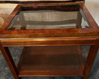 $60. Glass, brass and wood table with caned shelf.  27" x 22" x 22"h.  Available for Pre-sell which opens Wednesday April 18th at 9 am.