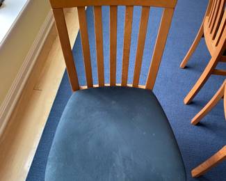 One of the six chairs sold with the dining table set.  Made in Italy for McKinnon Furniture store.