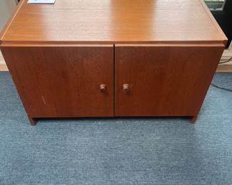 $160. Domino made in Denmark two door cabinet with a shelt.  32.25"w 15.5"d x 19.75"h.    As found - one hinge needs adjusting periodically.  Available for pre-sale which opens at 9 am Wednesday, April 18th.