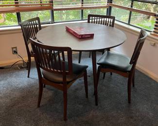 $240. Stakmore folding table and chairs.  Table is 42" diameter and approx. 28" high. Available for Pre-sell which opens Wednesday April 18th at 9 am.