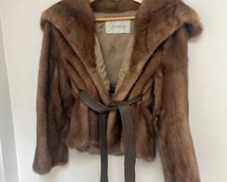 Beautiful Mink jacket with leather belt that cinches up the front.  Available for in-person shopping.