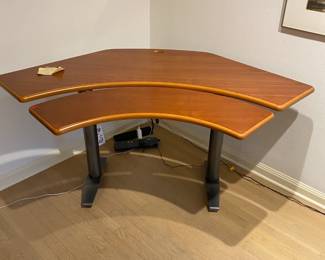 $60. Work station style desk curved for easy access to the entire surface.  61"w x 31"d x 29"h. Available for Pre-sell which opens Wednesday April 18th at 9 am.