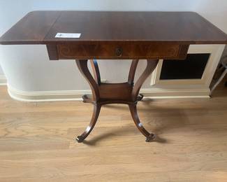 View of the table with drop leaves up.