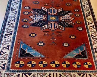 $160. Wool rust and blue oriental rug 7'8" x 5'11" some sun fading as found. Available for Pre-sell which opens Wednesday April 18th at 9 am.