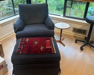 Chair and ottoman for sale during in-person sale hours Friday and Saturday.