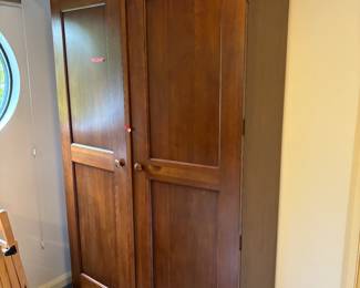 $40. Armoire with 5 shelves.  Perfect storage in a guest room,  48"w x 19"d x 79"h.