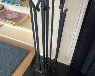 Fireplace solid iron tool set.  For sale during in-person shopping Friday and Saturday.