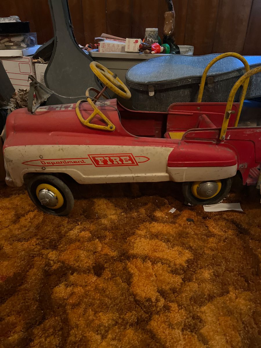 Darling vintage firetruck pedal car