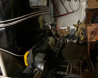 Back of 1930 Buick 4 door sedan with luggage rack stored in this garage since 1967