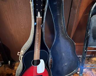 Guitar with steel enforced neck