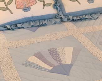 we have four hand made quilts--fan quilt along with little girl shams