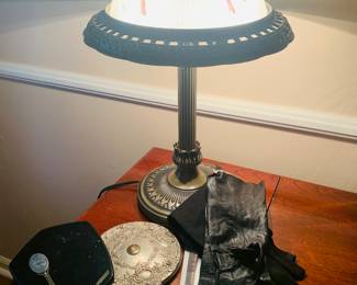 antique hand mirrors and a vintage lamp