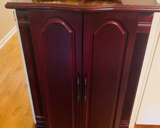 jewelry armoire with two unused party handbags 